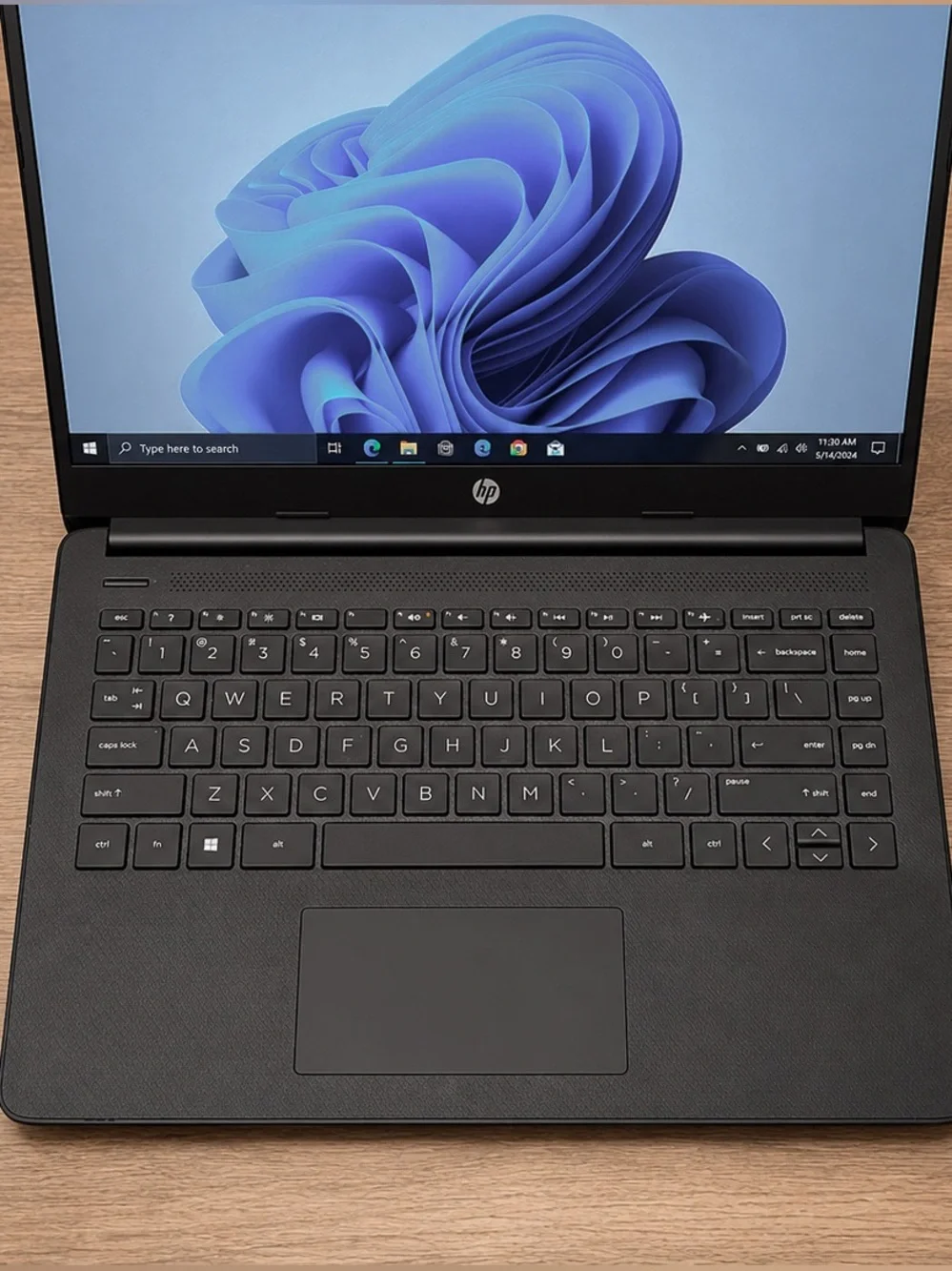 HP Black Laptop with Full Keyboard and Matte Finish